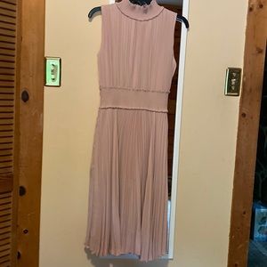 Light pink above the knee pleated dress, size 6, worn once